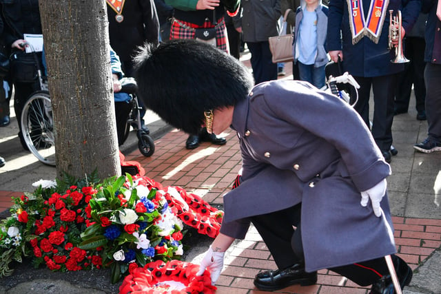 Wreaths are laid in memory of Frederick Starrett and James Cummings