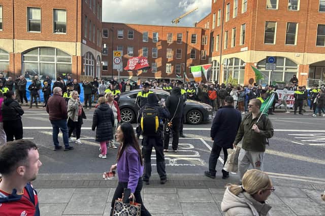 Opposing groups of demonstrators gather at a protest over a migrant camp on Mount Street in Dublin. Photo: Cillian Sherlock/PA Wire