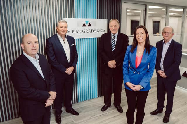 Northern Ireland firms M.B. McGrady & Co. chartered accountants, which has announced a strategic merger with Dawson & Company chartered accountants – its second firm in less than 12 months.  Pictured are Conaill McGrady, Mal McGrady, Maurice Dawson, Kim Rainey and Seamus McLernon