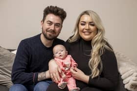 Marcus and Rachel Gilmore with their daughter Raina at their home outside Ballyclare