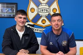 Limavady United manager Paul Owens welcomes Oisin Duffy to the club. (Photo by Limavady United FC)