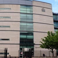 Personal trainer accused over bid to stab man to death
