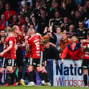 Crusaders players celebrate equalising after a deflected shot from Billy Joe Burns during their Europa Conference League qualifier against Rosenborg of Norway at Seaview, Belfast. PIC: Andrew McCarroll/ Pacemaker Press