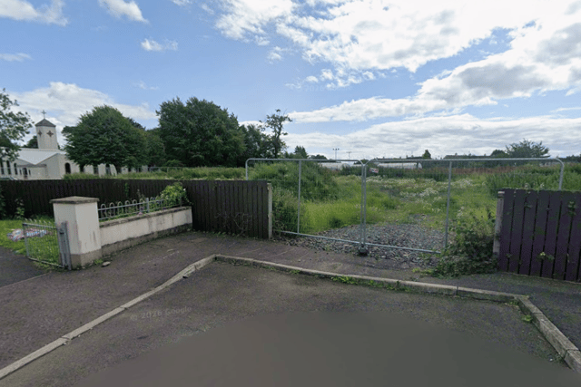 The development is slated for empty land next to a church. Image: Google