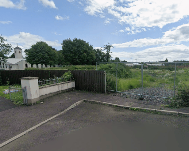 The development is slated for empty land next to a church. Image: Google
