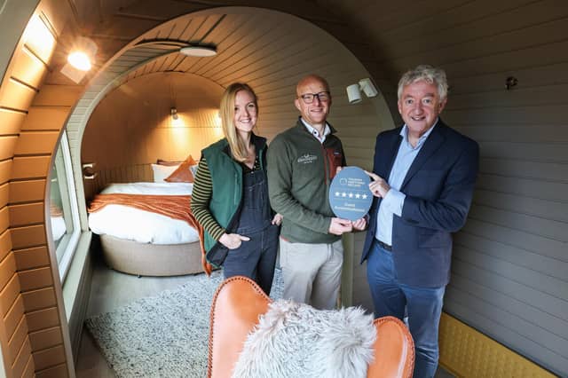 A glamping retreat in Newcastle has been awarded a five-star accommodation grade by Tourism Northern Ireland. Pictured is John McGrillen, CEO of Tourism Northern Ireland with Esme Porter and Andrew Porter, owners of Enniskeen Estate in Newcastle, which has been awarded a five-star accommodation grading by Tourism NI