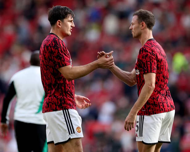 Harry Maguire and Jonny Evans while playing together for Manchester United. (Photo by Alex Livesey/Getty Images)