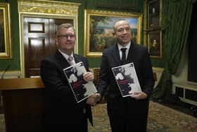 Former DUP leader Sir Jeffrey Donaldson and NI Secretary Chris Heaton-Harris with copies of the ‘Safeguarding the Union’ document struck earlier this year. Writing in the News Letter, DUP leader Gavin Robinson has previously said his party's agreement with the government 'goes further than ever before to undo the damage of the NI Protocol'.