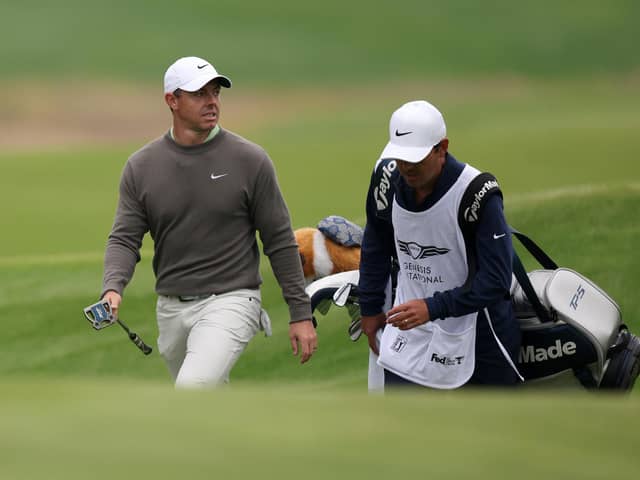 Rory McIlroy and caddie Harry Diamond walk to the seventh green during the third round of The Genesis Invitational at Riviera Country Club.