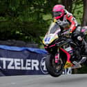 Caomhan Canny on the Scott Racing Suzuki at Ballaugh Bridge during qualifying week at the Isle of Man TT. (Photo by Alan Weir/Pacemaker Press)