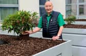 Jimmy Chapman with his specially chosen rhododendron that was planted in his honour