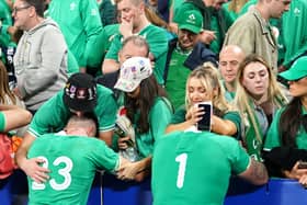 Ireland players and fans together in the disappointment of Saturday's Rugby World Cup loss to New Zealand. (Photo by Adam Davy/PA Wire)
