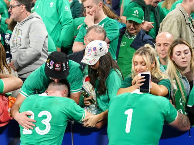 Ireland players and fans together in the disappointment of Saturday's Rugby World Cup loss to New Zealand. (Photo by Adam Davy/PA Wire)