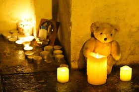 Candles and tributes left following following an attack on Parnell Square East in Dublin where five people were injured, including three young children. Photo: Niall Carson/PA Wire