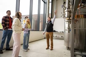 Visitors to the Shortcross Gin Discovery tour the modern facility, learn about the making of gin and enjoy a tasting.