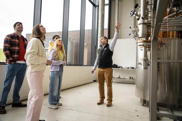 Visitors to the Shortcross Gin Discovery tour the modern facility, learn about the making of gin and enjoy a tasting.