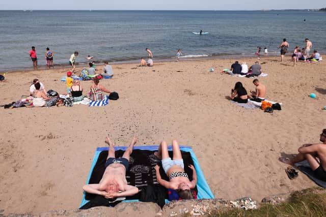 Enjoying the sunshine at Crawfordsburn Country Park on July 17, 2022. By the same date this month Northern Ireland has had 110% of its average July rainfall. Photo by Kelvin Boyes / Press Eye.