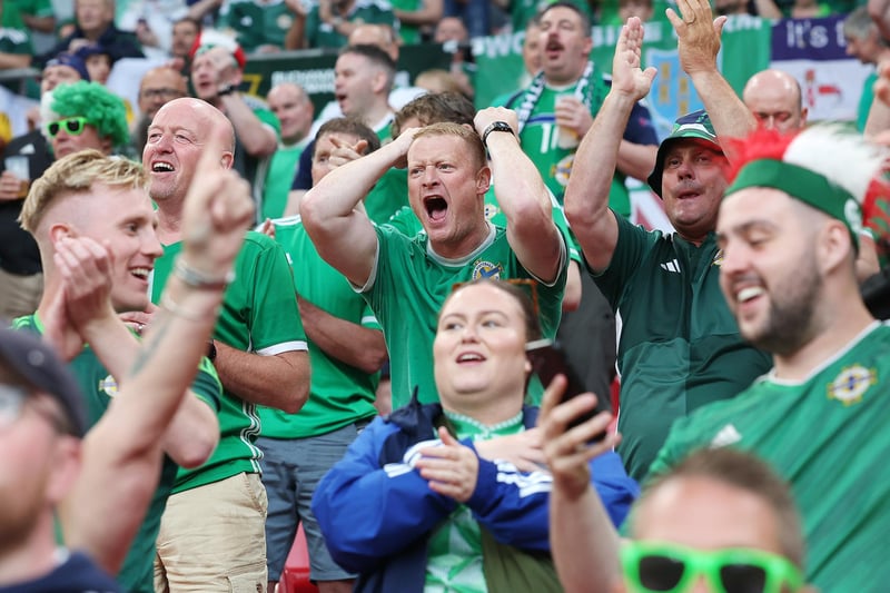 Northern Ireland fans watch on as their team play Denmark in Copenhagen