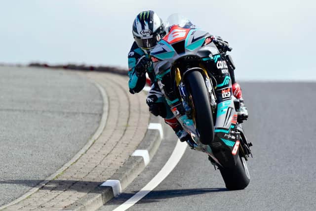 Michael Dunlop was fastest in Thursday's final Superstock qualifying session on his MD Racing Honda to secure second place on the grid overall as damp patches on the course kept speeds down