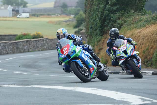 Dean Harrison (DAO Racing Kawasaki) and Mike Browne (Burrows Engineering/RK Racing BMW) at Ballabeg during practice at the Southern 100. Picture: Dave Kneen/Pacemaker Press.