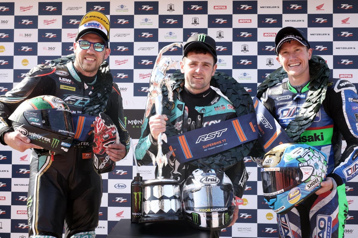 Records were broken in the opening six-lap Superbike showdown at the Isle of Man TT