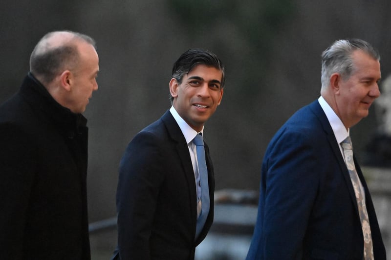 Prime Minister Rishi Sunak (centre) with Northern Ireland Secretary Chris Heaton-Harris and new appointed speaker of the Northern Ireland Assembly Edwin Poots arriving at Parliament Buildings at Stormont Castle, Belfast, following the restoration of the powersharing executive.