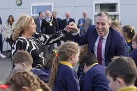 Northern Ireland Education Minister Paul Givan takes part in a ceili dance during a visit to Irish language-medium school, Gaelscoil Aodha Rua, in Dungannon, Co Tyrone. Picture date: Wednesday March 6, 2024. Photo: Niall Carson/PA Wire