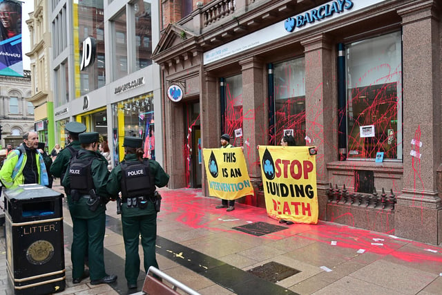 Pacemaker Press 14 November 2022: Extinction Rebellion smears Barclays with red paint in new day of UK-wide climate action.