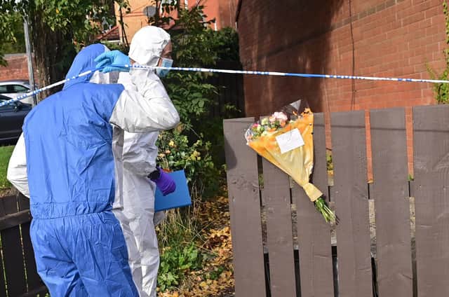 Forensics at the scene of  the murder of a 54-year-old man in Poleglass in west Belfast