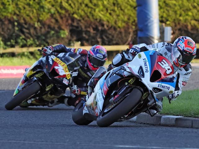 Alastair Seeley leads Davey Todd on his way to victory in the Superstock class at the 2023 North West 200