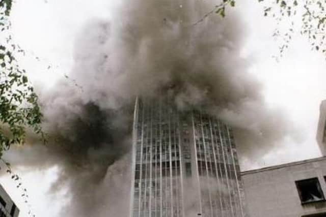 An image showing the immediate aftermath of the Bishopsgate explosion, which killed a news photographer tasked to cover the bomb alert; the huge device was made possible by Rose Dugdale's explosive ingenuity