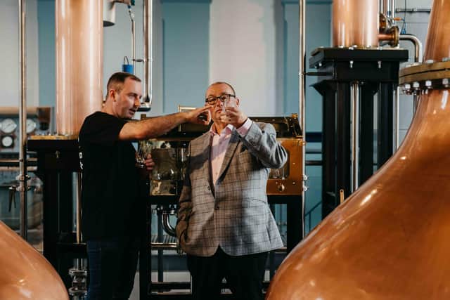 Titanic Distillers director Peter Lavery (right) discussing the whiskey-making process with Head Distiller Damien Rafferty at Thompson Dock, Belfast