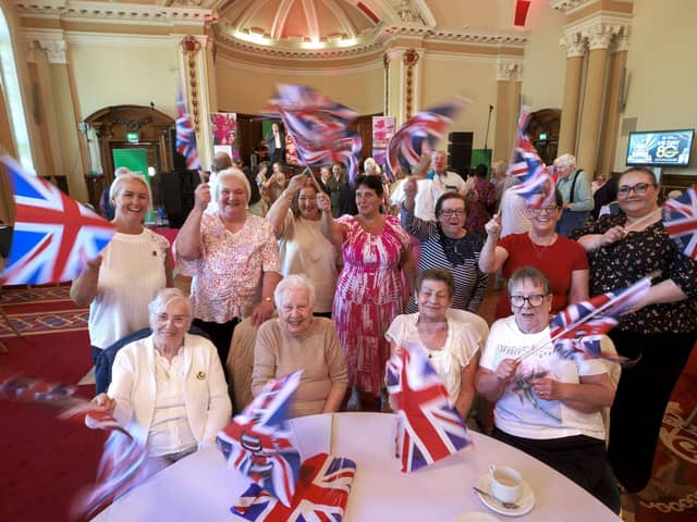 Women enjoy themselves at a tea party in Belfast City Hall, and King Charles III leaves yesterday’s Westminster Abbey service  Pics: Liam McBurney and Aaron Chown/PA Wire