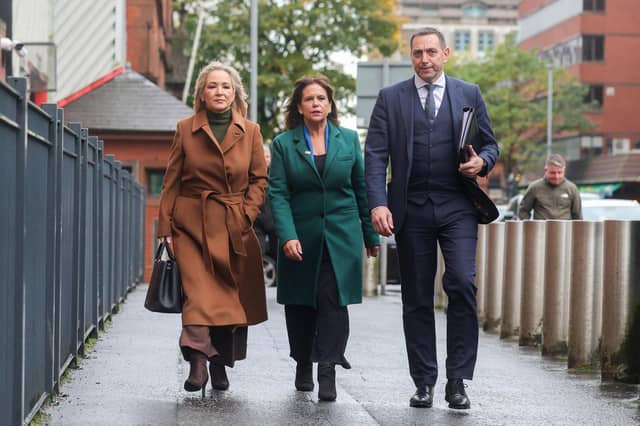Sinn Fein president Mary Lou McDonald and First Minister Michelle O'Neill (and lawyer Pádraig Ó Muirigh) outside Musgrave PSNI Station in Belfast city centre