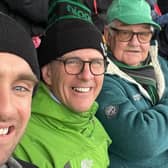 BBC Correspondant Mark Simpon (with black hat) and his father John (with green basball cap) at the Ballymena Vs Sullivan Schools Cup semi-final this week. Mark gave his father a Sullivan hat to wear for the match, but being a Ballymena old boy, he passed it to Mark's nephew, Joe, far left.