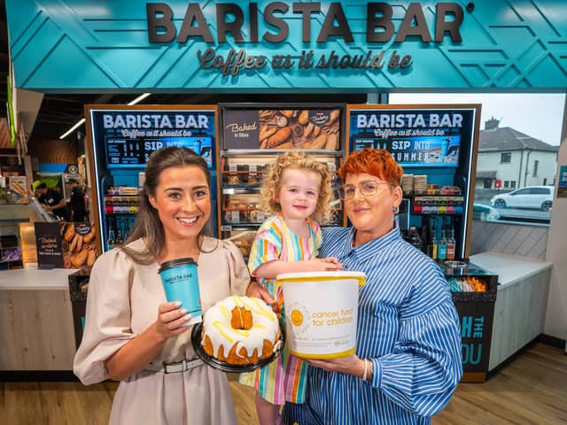 Laura Thompson from Henderson Group  with Niamh Clarke (left) and her daughter Dotty to launch the 2023 Community Coffee Morning with Eurospar and Vivoxtra for Cancer Fund for Children.