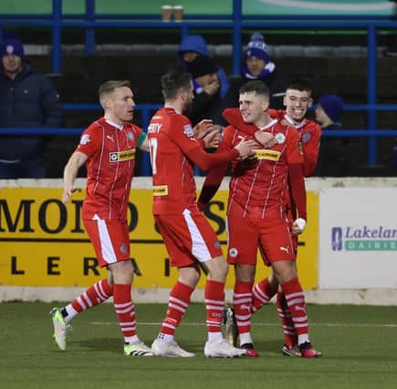 Ronan Hale celebrates his match winning goal for Cliftonville at The Showgrounds