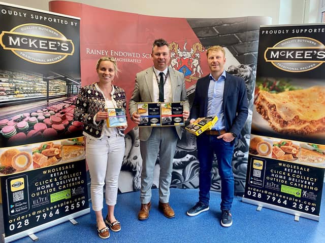 Historic Northern Ireland school has ‘cooked up’ a surprising sponsorship link with a fourth generation family butchers. Pictured are Mrs Emma Beverland (Rainey Endowed Home Economics teacher), Mr Mark McCullough (Rainey Endowed Principal) and Mr Paul Gibson (McKee's managing director)