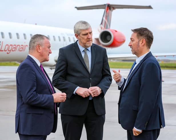 Economy Minister Conor Murphy and Infrastructure Minister John O'Dowd with  Steve Frazer, Managing Director, City of Derry Airport, at the announcement of funding to protect the continuation of flights from the airport to London Heathrow. Photo: Lorcan Doherty/PA Wire