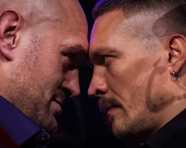 Britain's Tyson Fury (L) and Ukraine's Oleksandr Usyk (R) collide in Riyadh on Saturday night