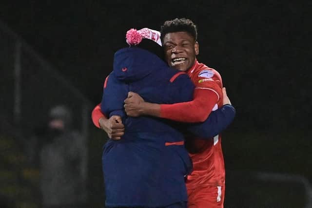 Benny Igiehon celebrating a Premiership victory with Portadown in 2023. (Photo by Colm Lenaghan/Pacemaker)