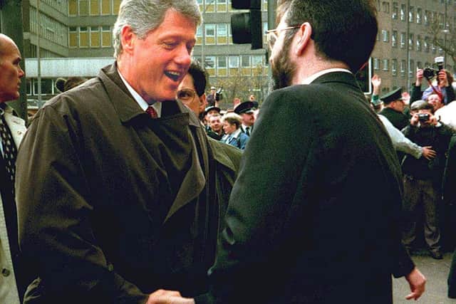 President Clinton meets SF's Gerry Adams on the Falls Road, Belfast in 1995. Adams made it clear that year that momentum towards a united Ireland was necessary in any “peace process”: UK policy was first presented in the 1993 Downing St Declaration and then the 1996 Framework Documents. The Belfast Agreement was the final piece in the plan. UK strategy has made unionists feel ever more deceived