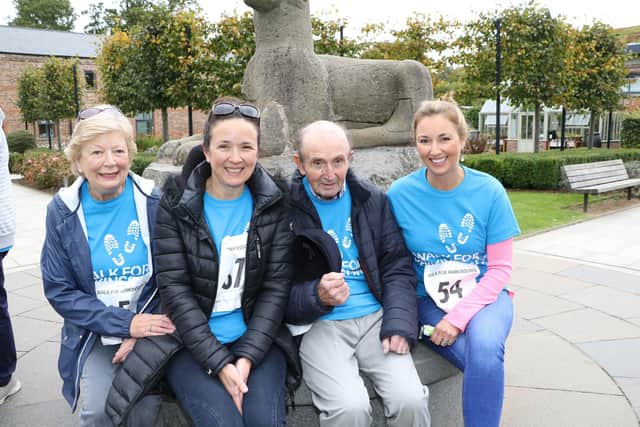 Claire McCollum with mum Margaret, sister Kelly and dad Sam supporting the 2018 Parkinsons Walk in Antrim Castle Gardens.
