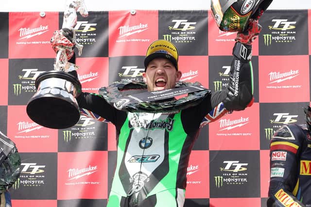 Peter Hickman celebrates victory in the Senior TT in 2022, his ninth win at the event.