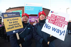 Nurses Sarah Donnelly (left) and Nicola Joyce on the picket line outside the Royal Victoria Hospital in Belfast in 2022, as nurses in England, Wales and Northern Ireland took industrial action over pay. Picture date: Tuesday December 20, 2022.