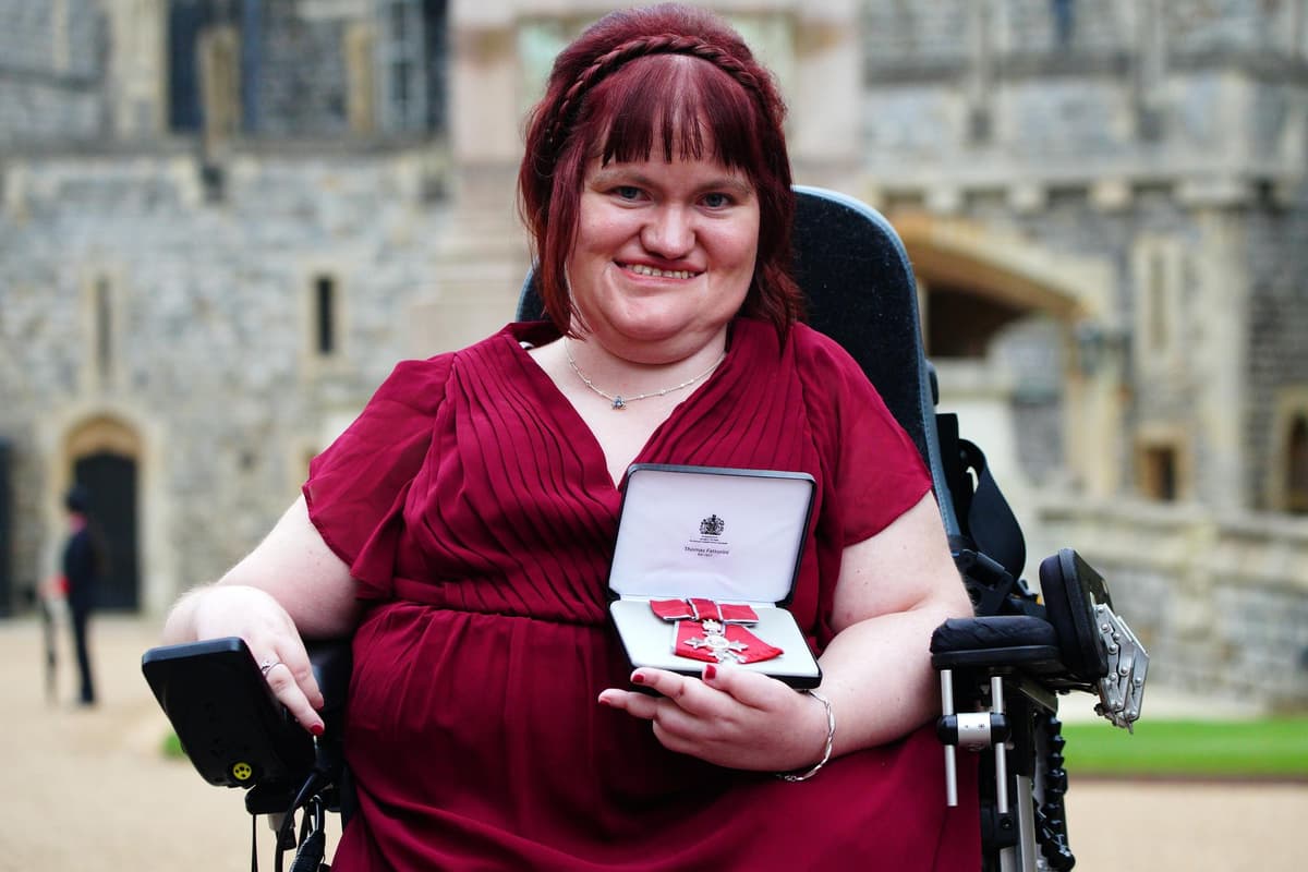 Disability rights activist Michaela Hollywood becomes MBE in Windsor Castle ceremony