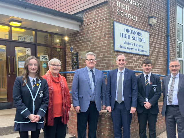 The DUP education minister announced he was lifting a pause on urgent school building projects on a visit to Dromore High School