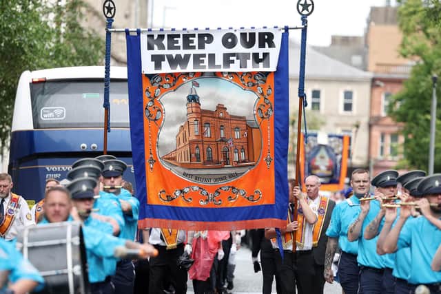 The annual 12th July Orange Order Belfast parade makes its way along Bedford Street