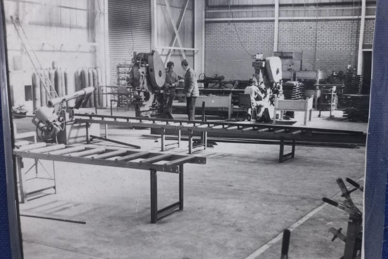 Men pictured at work in Sperrin Metal's factory during the 1970s