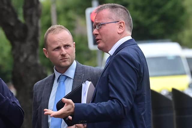The loyalist Jamie Bryson outside court in Newtownards last month with John Larkin KC. Mr Bryson says: “The breach of Article VI is caused, most egregiously, by the continued application of EU law" Pic Colm Lenaghan/Pacemaker